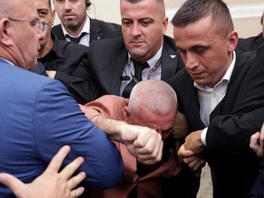 Albanian opposition MPs try to disrupt Parliament to protest a colleague's imprisonment