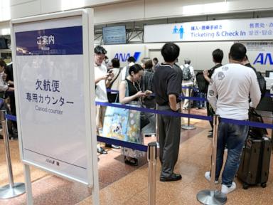 Tropical storm hits Tokyo area, leaving thousands without power before moving west