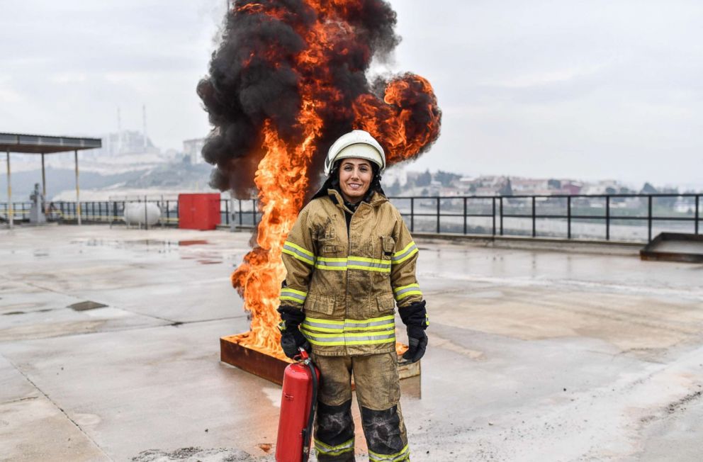 PHOTO: Devrim Ozdemir, a female firefighter, poses during a training session on Feb, 20, 2018 in Izmir, Turkey. 