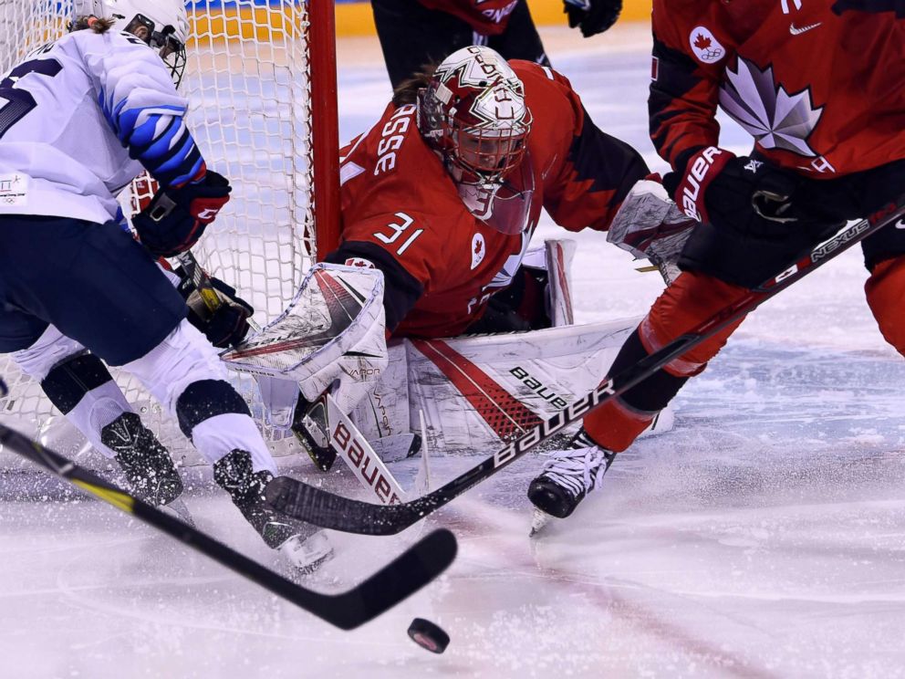 PHOTO: Canadas Genevieve Lacasse defends her goal in the womens preliminary round ice hockey match between the U.S. and Canada during the Pyeongchang 2018 Winter Olympic Games in Gangneung on Feb. 15, 2018.