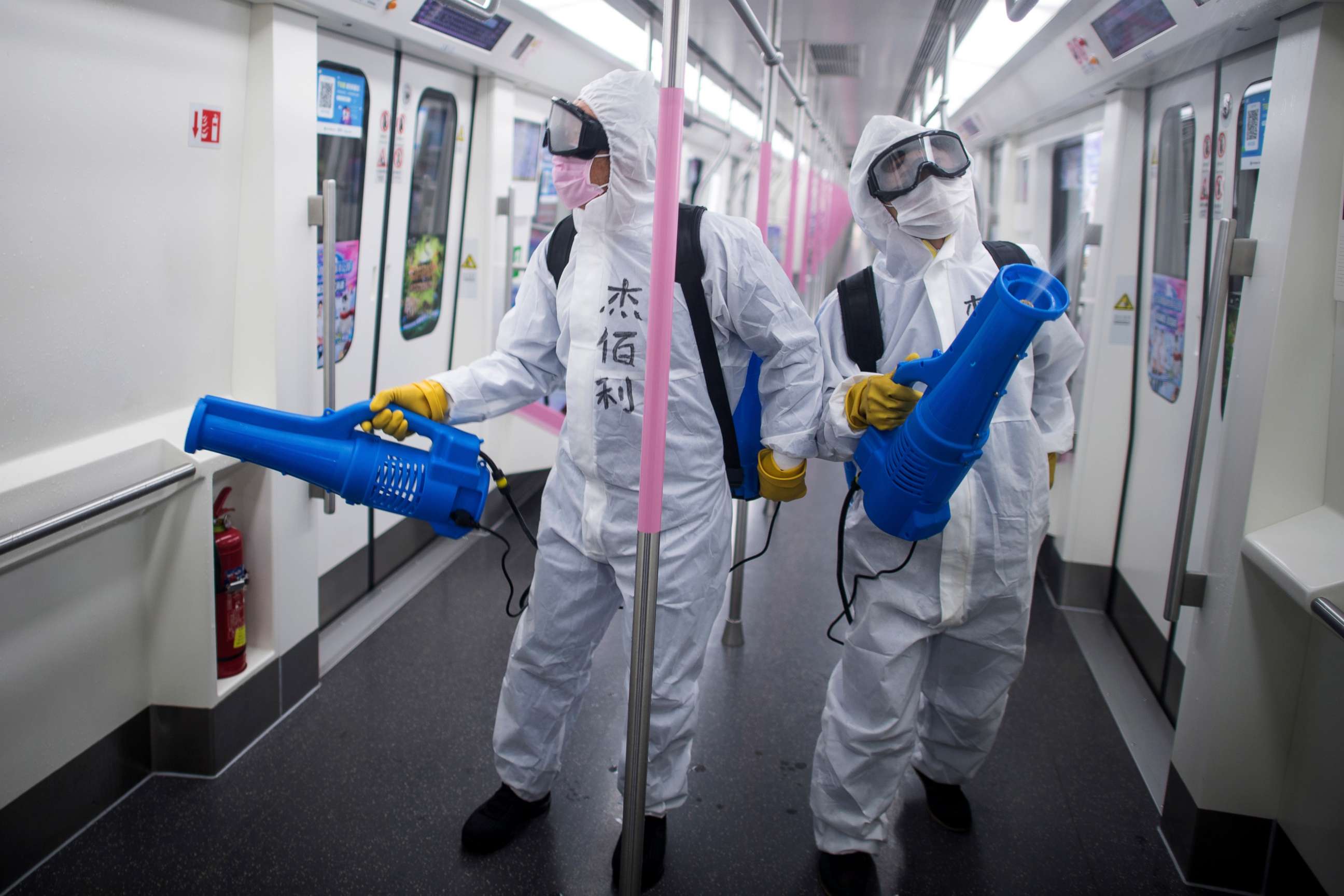 PHOTO: In this photo released by Xinhua News Agency on March 23, 2020, workers disinfect a subway train in preparation for the restoration of public transport in the city of Wuhan in China's central Hubei province.