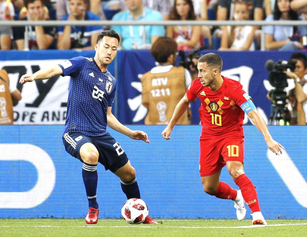 PHOTO: Eden Hazard (R) of Belgium is marked by Maya Yoshida of Japan during the first half of a World Cup round-of-16 match in Rostov-On-Don, Russia, July 2, 2018. Belgium won 3-2.