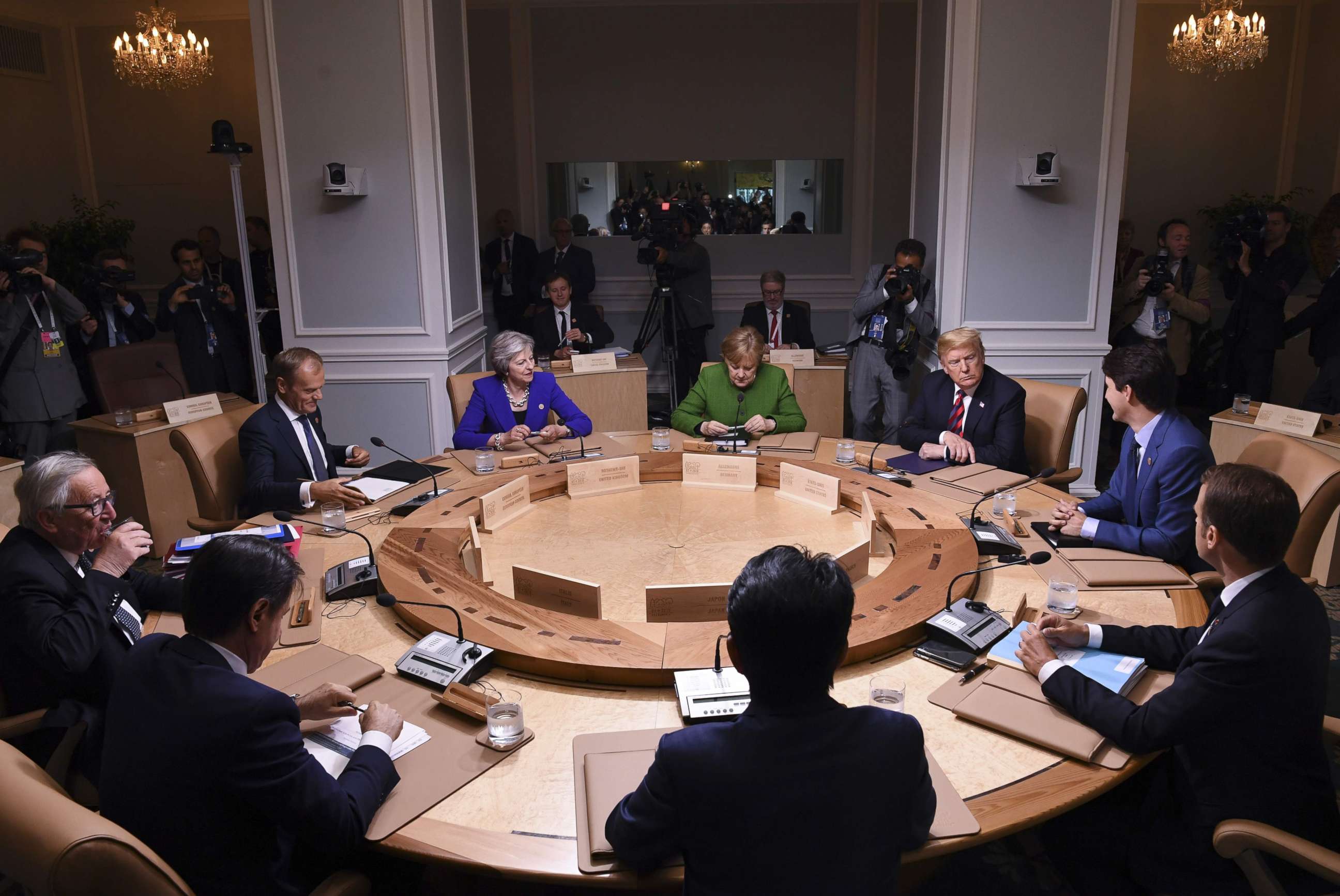 PHOTO: Leaders of the G7 participate in a working session of the G7 Summit in La Malbaie, Quebec, Canada, June 8, 2018.
