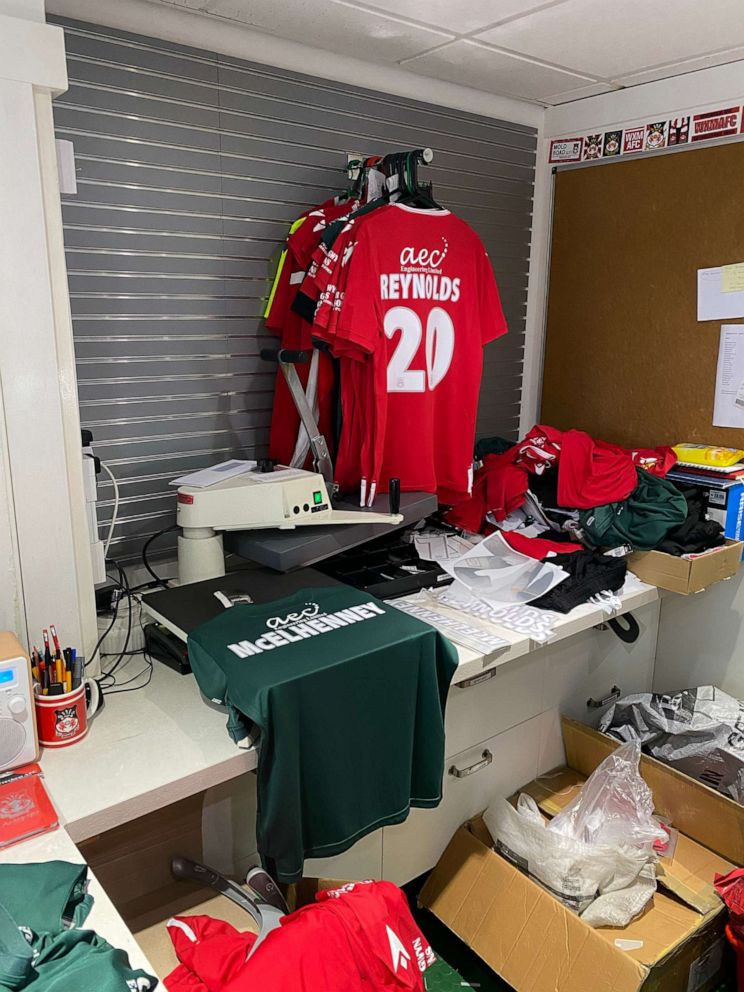 PHOTO: In the club shop, Wrexham soccer jerseys are being sold with 'Reynolds' and McElhenney' on the back.
