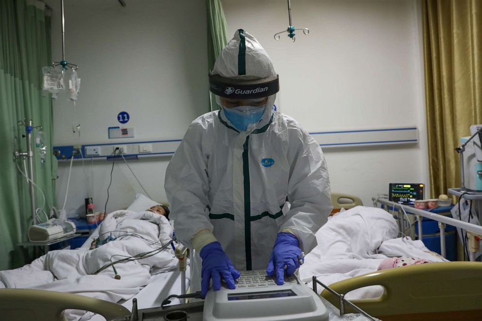 PHOTO: A medical worker in a protective suit is seen at an isolated ward of a hospital in Caidian district following an outbreak of the novel coronavirus in Wuhan, Hubei province, China, Feb. 6, 2020.