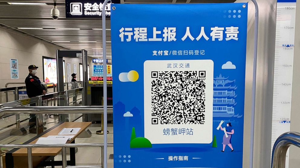 PHOTO: In this April 1, 2020, file photo, a QR code is set up for passengers to check their green pass status at a subway station in Wuhan in central China's Hubei province.