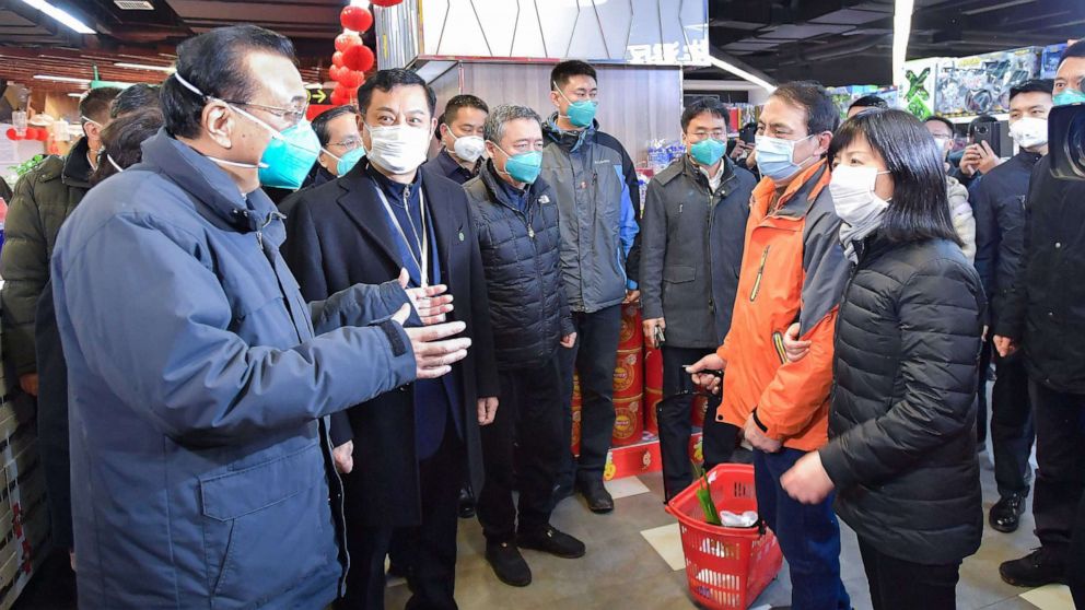 PHOTO: Chinese Premier Li Keqiang talks with residents at Wuhan Wushang Supermarket in Wuhan, central China's Hubei Province, Jan. 27, 2020