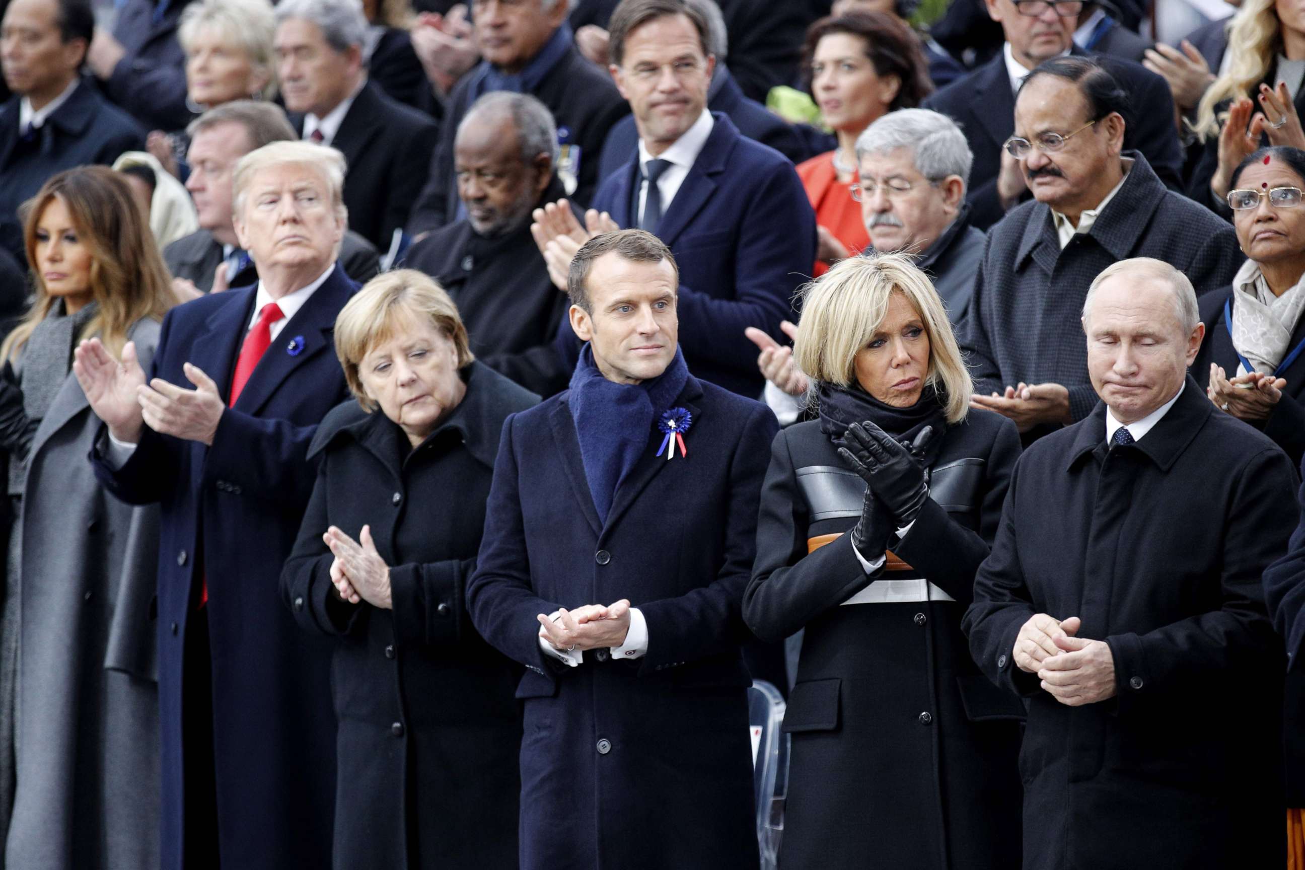 PHOTO: First Lady Melania Trump, President Donald Trump, German Chancellor Angela Merkel, French President Emmanuel Macron and his wife Brigitte Macron and Russian President Vladimir Putin attend a ceremony at the Arc de Triomphe in Paris, Nov. 11, 2018.