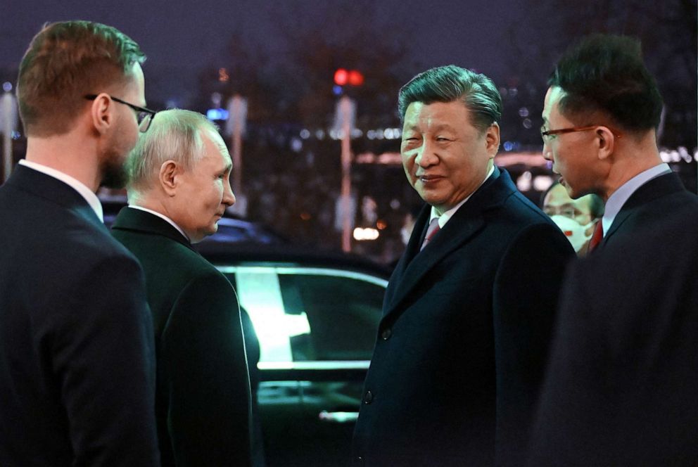 PHOTO: Russian President Vladimir Putin and Chinese President Xi Jinping leave after a reception in honor of the Chinese leader's visit to Moscow, at the Kremlin in Moscow, Russia March 21, 2023.