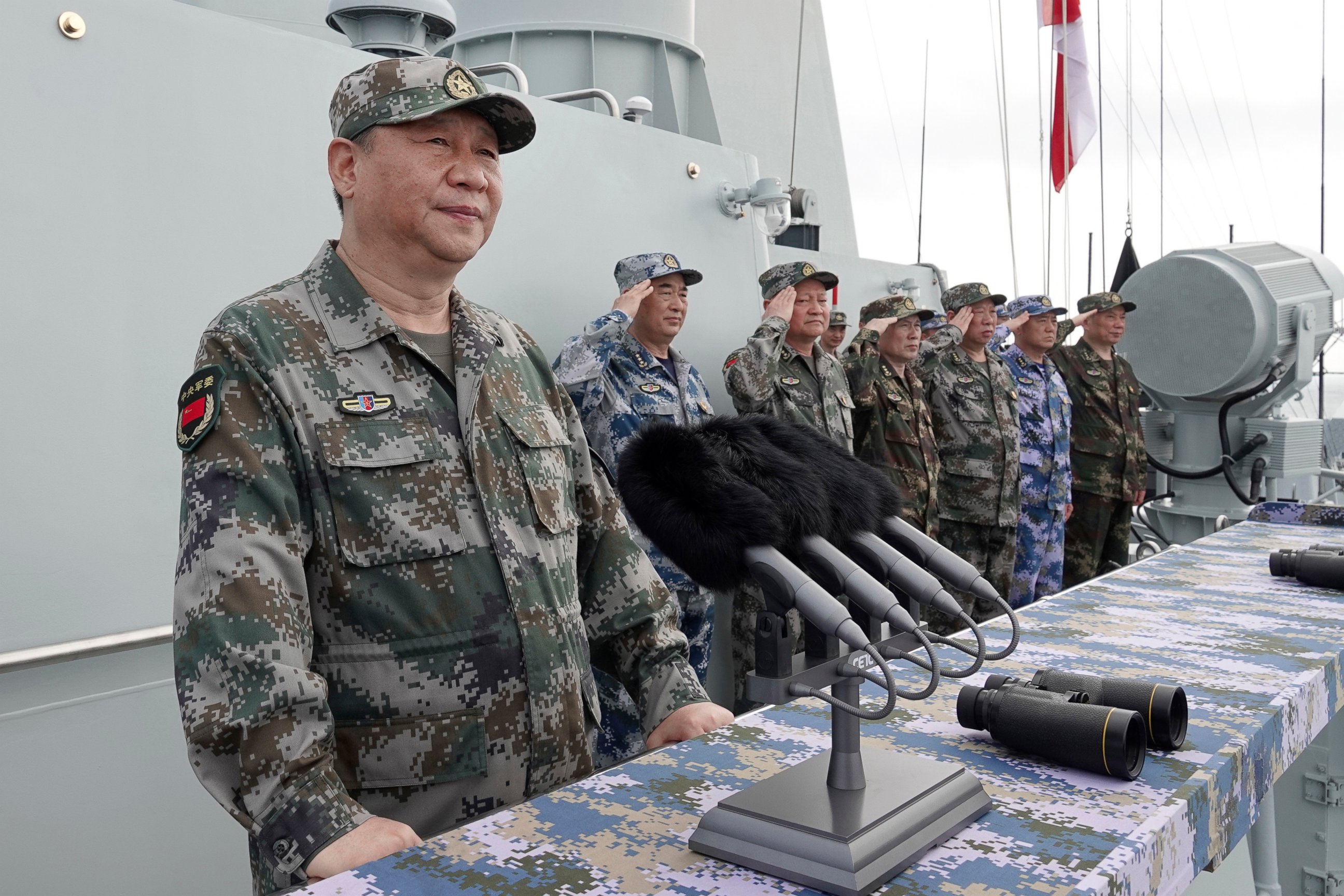 PHOTO: In this April 12, 2018, file photo released by Xinhua News Agency, Chinese President Xi Jinping speaks after reviewing the Chinese People's Liberation Army (PLA) Navy fleet in the South China Sea.