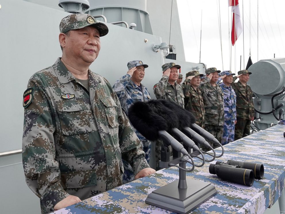 PHOTO: In this April 12, 2018, file photo released by Xinhua News Agency, Chinese President Xi Jinping speaks after reviewing the Chinese Peoples Liberation Army (PLA) Navy fleet in the South China Sea.