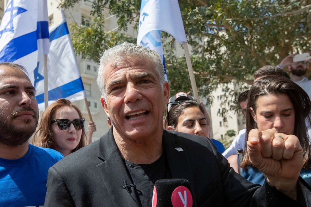 PHOTO:Yair Lapid makes a statement to the press after casting his vote in a school during the Israeli general elections in the Ramat Aviv area of Tel Aviv, Israel, April 9, 2019.