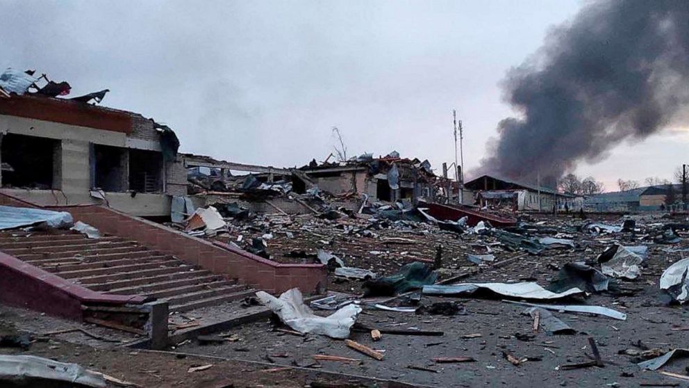 PHOTO: Smoke rises amid damaged buildings following an attack on the Yavoriv military base, during Russia's invasion of Ukraine, in Yavoriv, Ukraine, March 13, 2022.
