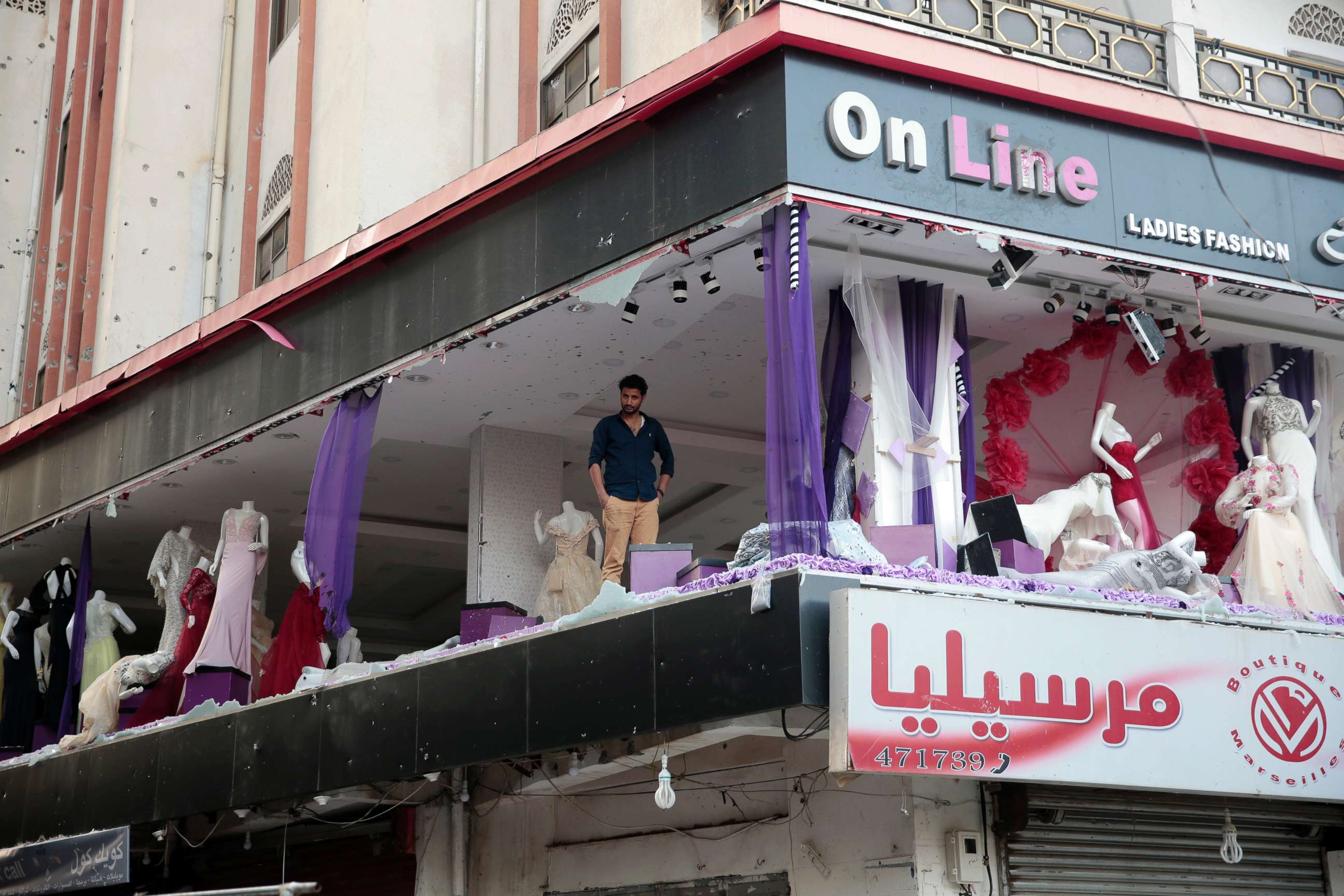 PHOTO: A Yemeni man inspects his damaged store near the residence of Yemen's former President Ali Abdullah Saleh in Sanaa, Yemen, Dec. 4, 2017.