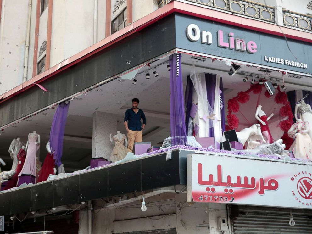 PHOTO: A Yemeni man inspects his damaged store near the residence of Yemens former President Ali Abdullah Saleh in Sanaa, Yemen, Dec. 4, 2017.