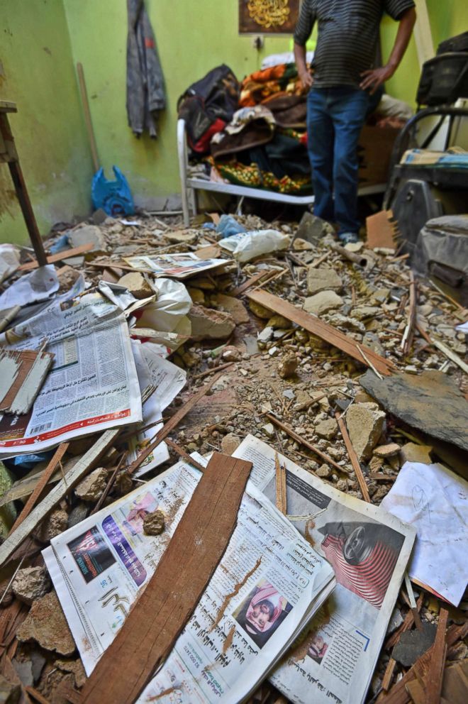 PHOTO: A picture taken March 26, 2018 in Um Al-Hammam district in Riyadh shows rubble, debris, and old newspapers scattered over a home hit by falling shrapnel from Yemeni rebel missiles that were intercepted over the Saudi capital.