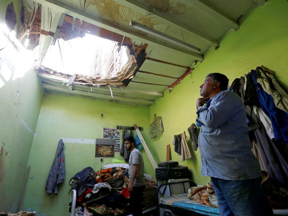 PHOTO: People check the damage after debris from ballistic missiles fired by Yemens Houthi militia fell onto a house in Riyadh, Saudi Arabia, March 26, 2018.