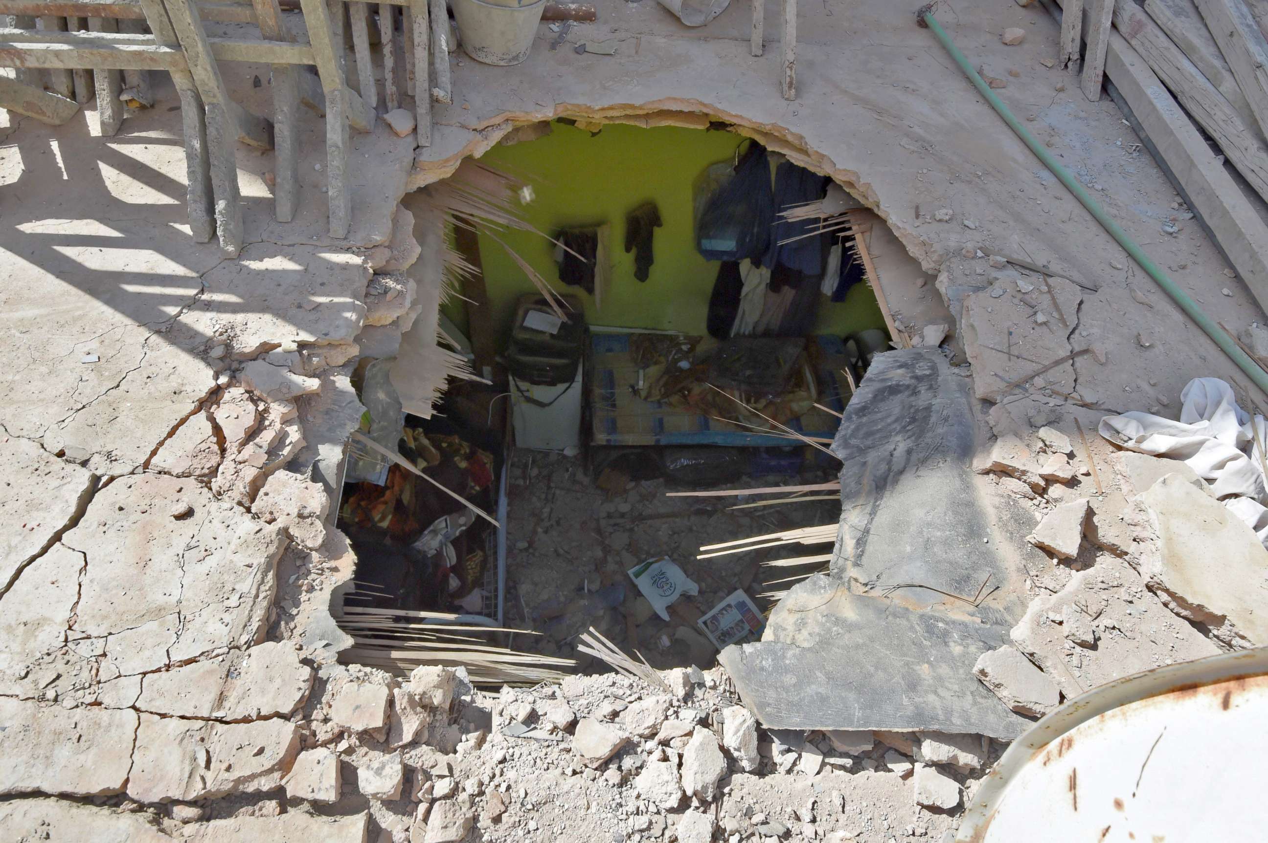 PHOTO: In the Um Al-Hammam district in Riyadh shows the pierced ceiling of a home hit by falling shrapnel from Yemeni rebel missiles that were intercepted over the Saudi capital, March 26, 2018.