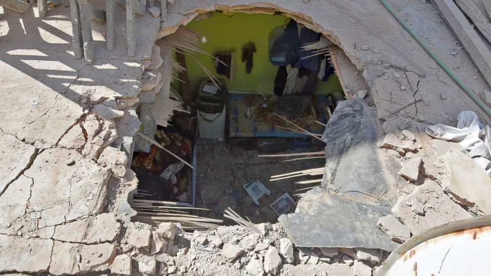 PHOTO: In the Um Al-Hammam district in Riyadh shows the pierced ceiling of a home hit by falling shrapnel from Yemeni rebel missiles that were intercepted over the Saudi capital, March 26, 2018.