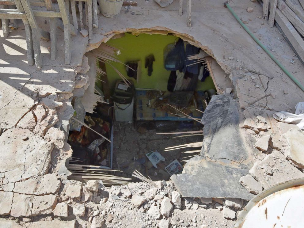 PHOTO: In the Um Al-Hammam district in Riyadh shows the pierced ceiling of a home hit by falling shrapnel from Yemeni rebel missiles that were intercepted over the Saudi capital, March 26, 2018.