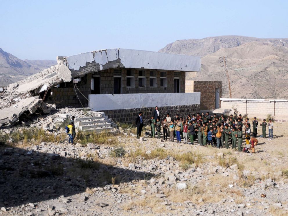 PHOTO: Yemeni students gather in lines for morning assembly on the first week of a new school year at a public school bombed by Saudi-led air strikes in Ibb, Yemen, Oct. 18, 2017.