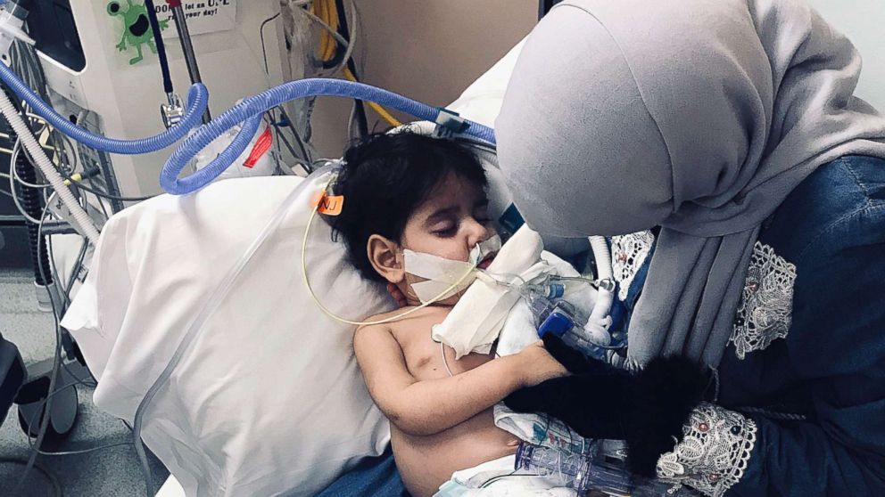 Shaima Swileh holds her dying 2-year-old son Abdullah at a hospital in Oakland, Calif., Dec. 19, 2018, in a photo released by the Council on American-Islamic Relations, Sacramento Valley. Swileh, a Yemeni mother who fought for the right to see her dying son, arrived Wednesday night after the Trump administration gave her a long-sought waiver to its travel ban.