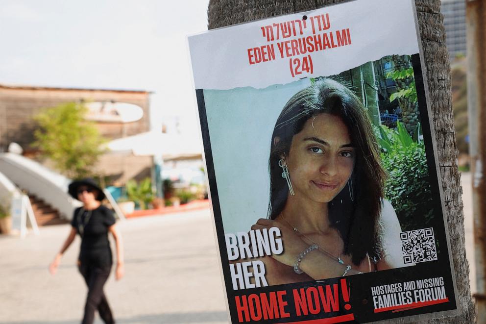 PHOTO: A woman walks near a poster showing Eden Yerushalmi, who was taken hostage by Hamas during the Oct. 7 attacks, and whose body has been recovered from a tunnel in the Rafah area of the Gaza Strip, in Tel Aviv, Israel Sept. 1, 2024.
