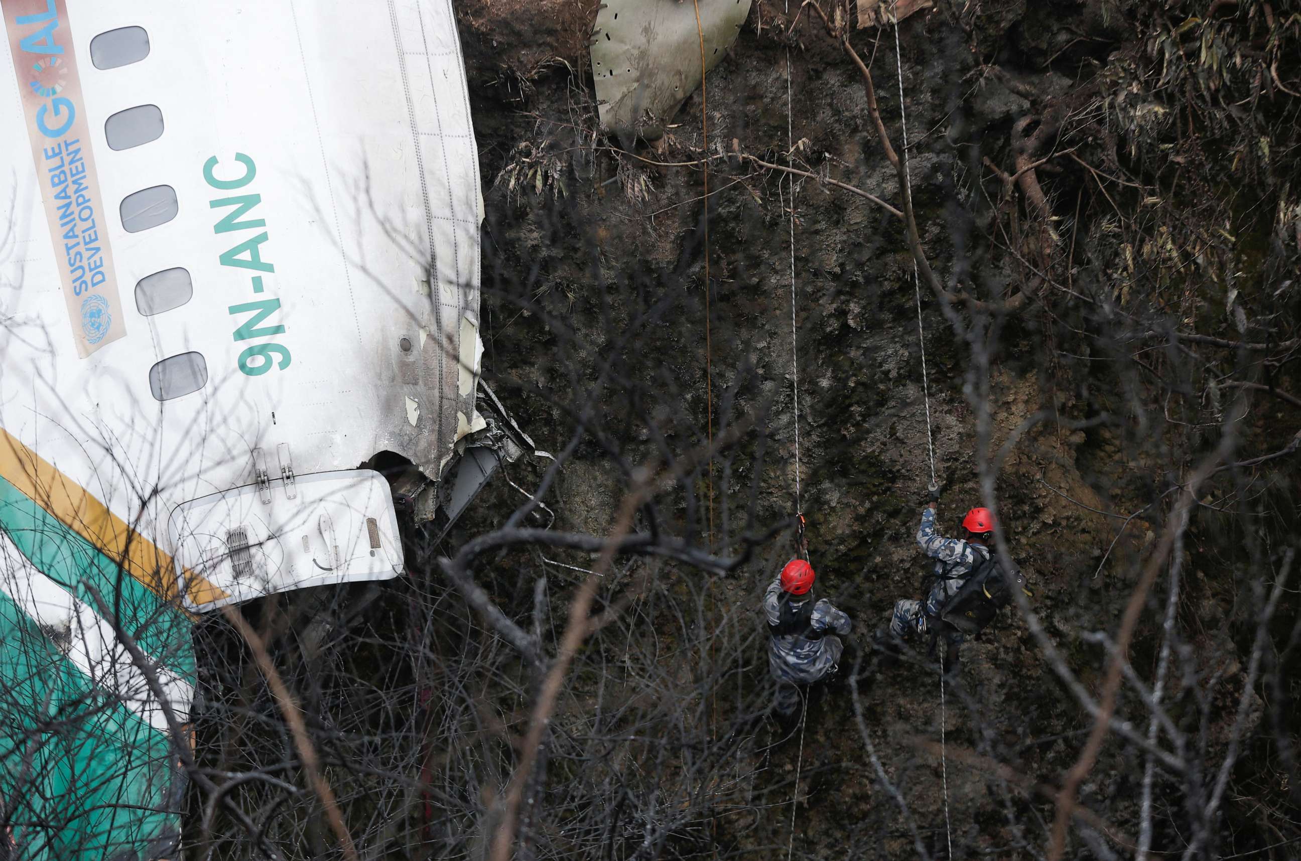 PHOTO: A rescue team works to recover victims from the site of the plane crash of a Yeti Airlines aircraft, in Pokhara, Nepal, Jan. 16, 2023.