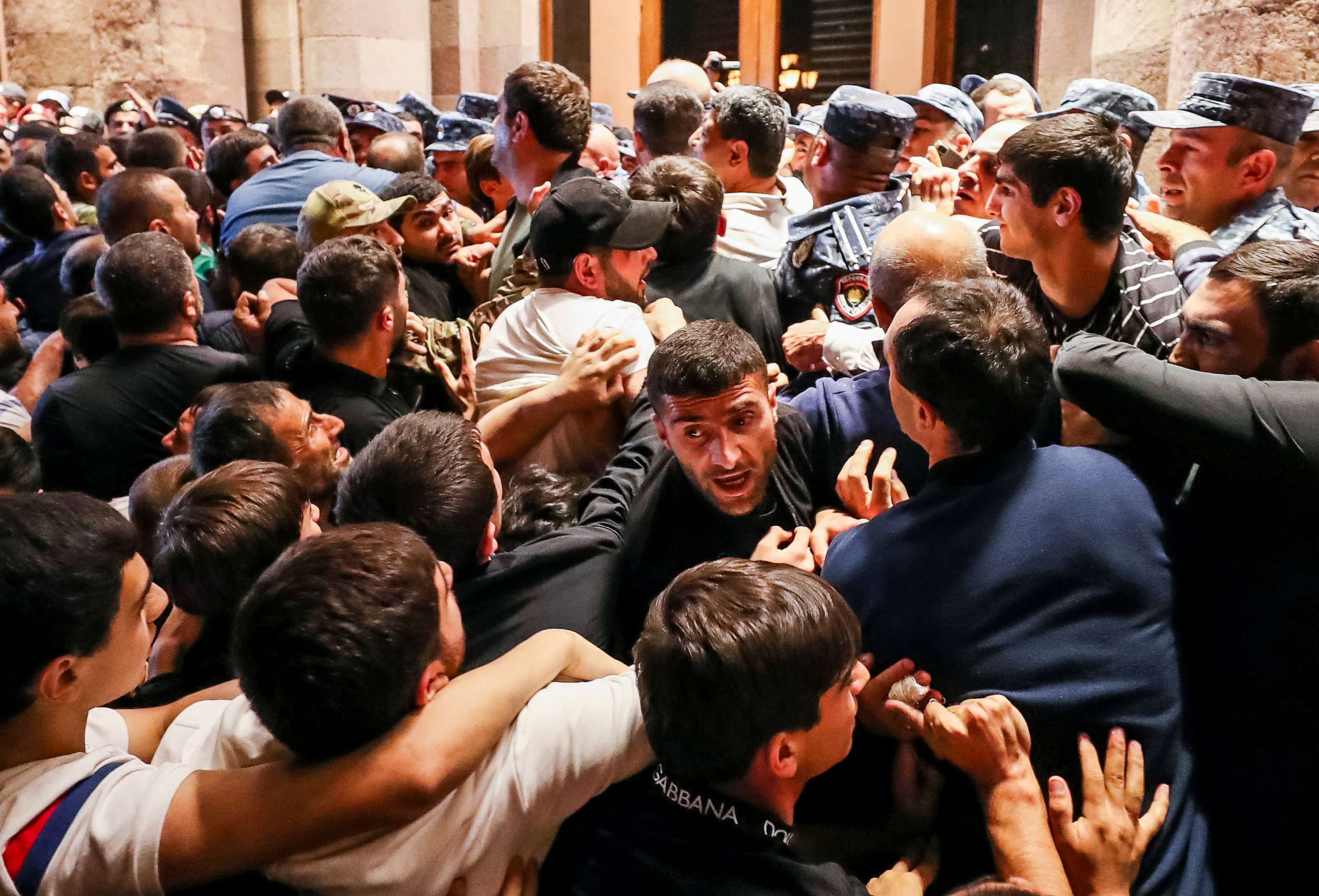 PHOTO: Demonstrators clash with police at the Armenia government building to protest against Prime Minister Nikol Pashinyan, Tuesday, Sept. 19, 2023, in Yerevan, Armenia.