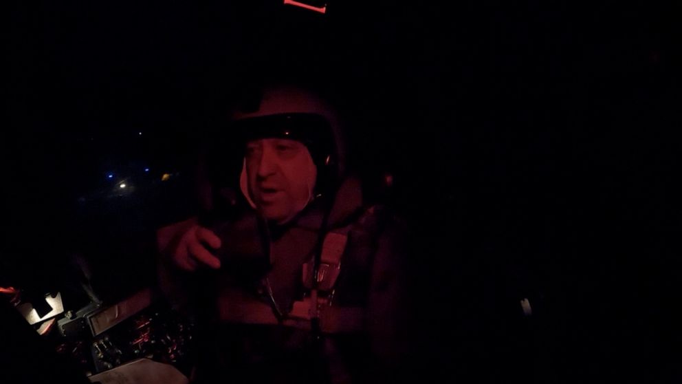 FILE PHOTO: The founder of Russia's Wagner mercenary group Yevgeny Prigozhin is seen inside a cockpit of a military Su-24 bomber plane over an unidentified location, in the course of Russia-Ukraine conflict, in this image taken from handout footage.