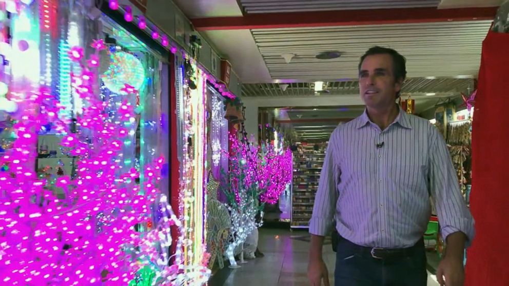 PHOTO: ABC News' Bob Woodruff tours Christmas shops in Yiwu, China. 