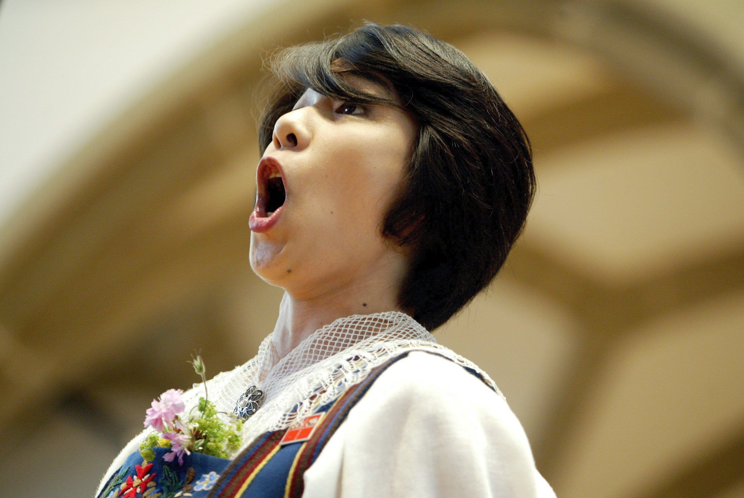 PHOTO: Yodeler Ito Keiko from Tokyo yodels during the 26th National Yodeling Festival in Aarau, Switzerland on June 18, 2005.