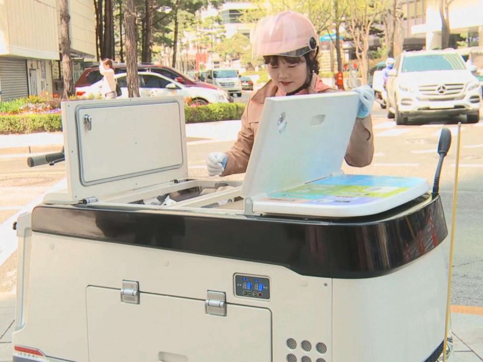 PHOTO: South Koreas yogurt ladies ride motorized fridges to fulfill your dairy needs.
