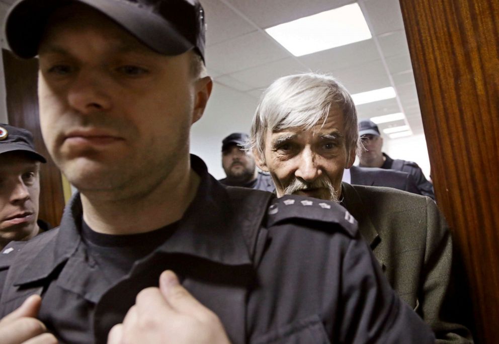 PHOTO: Russian historian Yuri Dmitriyev, right, arrives for the verdict at a court in the city of Petrozavodsk, Russia, April 6, 2018.