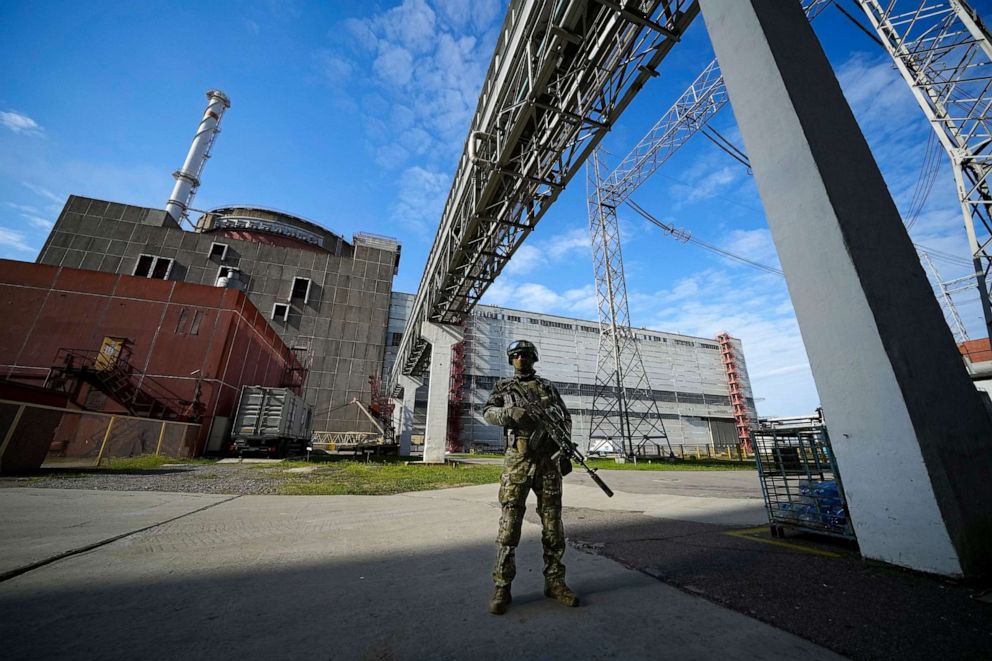 PHOTO: In this file photo, a Russian serviceman guards in an area of the Zaporizhzhia Nuclear Power Station in territory under Russian military control, southeastern Ukraine, on May 1, 2022.