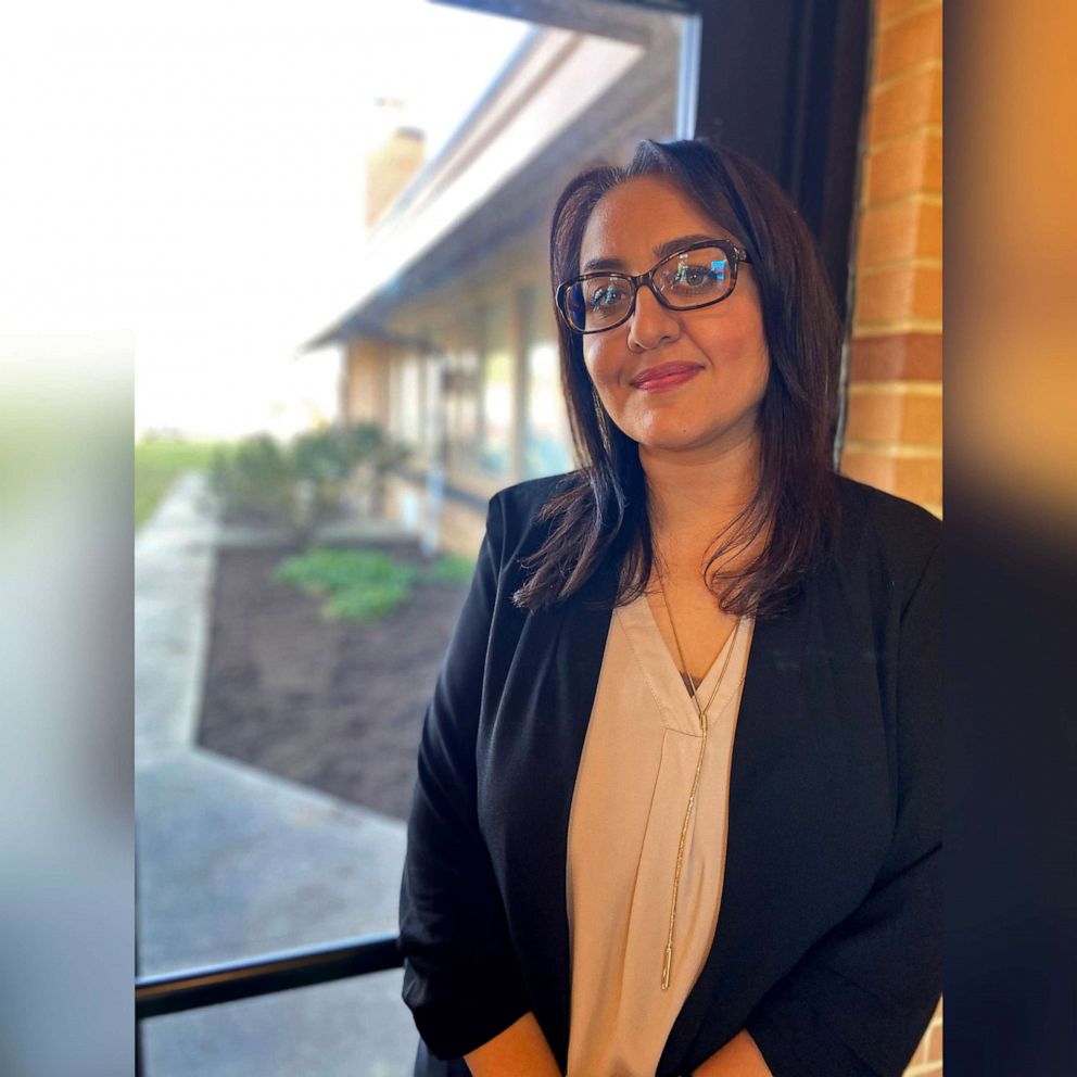 PHOTO: Zarmina Hamidi, a self described "double refugee" and caseworker for Lutheran Immigration and Refugee Service (LIRS) attends a ribbon-cutting ceremony for a newly-launched resettlement office in Alexandria, Va., Dec. 16, 2021.