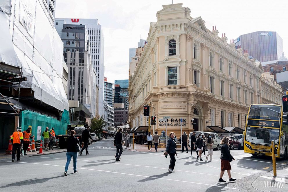 PHOTO: People walk on a street in Wellington on May 14, 2020.