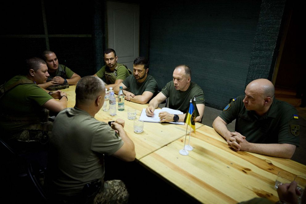 PHOTO: President of Ukraine Volodymyr Zelensky (2ndL) and the colonel general Oleksandr Syrskyi (L) visiting the brigades engaged in offensive operations in the Bakhmut sector, in Donetsk region, amid the Russian invasion of Ukraine, Sept. 5, 2023.