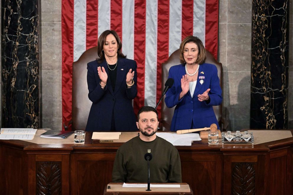 PHOTO: Ukraine's President Volodymyr Zelenskyy addresses the U.S. Congress as Vice President Kamala Harris, left, and House Speaker Nancy Pelosi applaud, Dec. 22, 2022, at the U.S. Capitol in Washington, D.C.