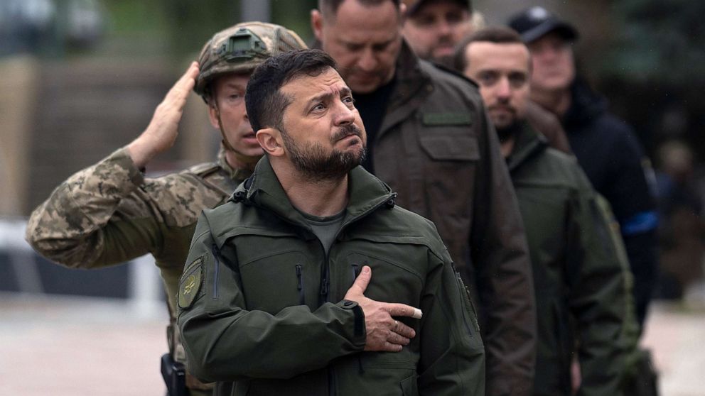 PHOTO: Ukrainian President Volodymyr Zelenskyy takes part in a national flag-raising ceremony in Izium, Ukraine, Sept. 14, 2022, after the town was retaken from Russian forces.