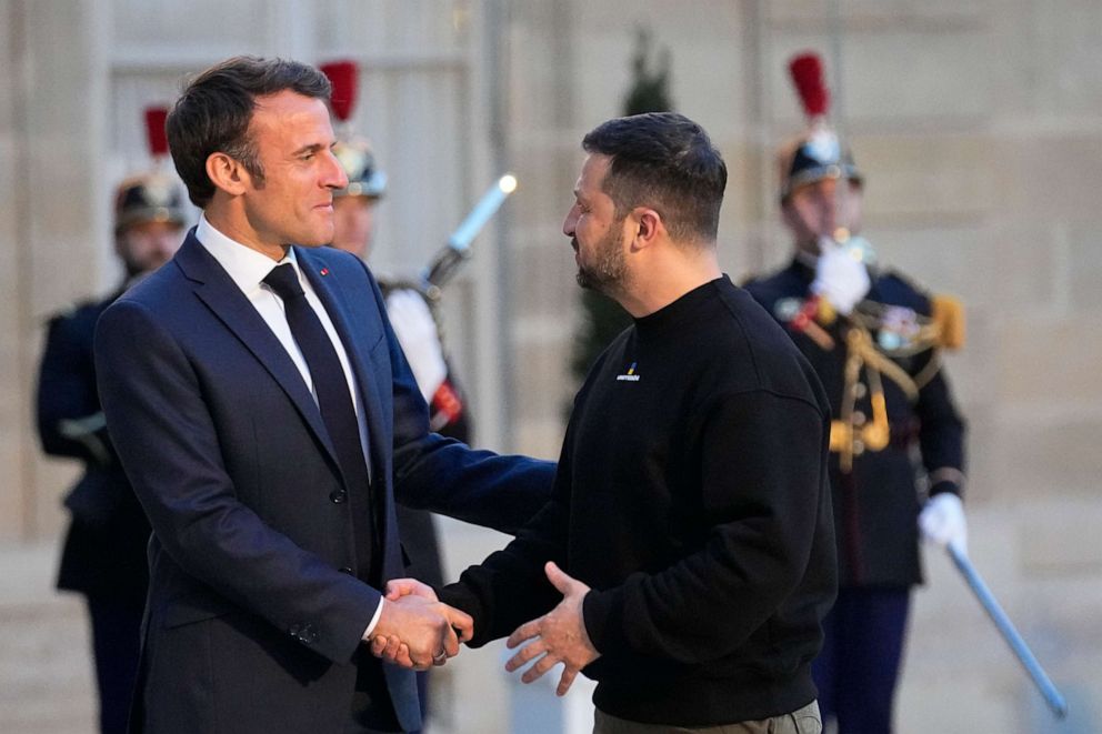 PHOTO: French President Emmanuel Macron, left, welcomes Ukrainian President Volodymyr Zelenskyy at the Palais de l’Élysée in Paris, Sunday, May 14, 2023.
