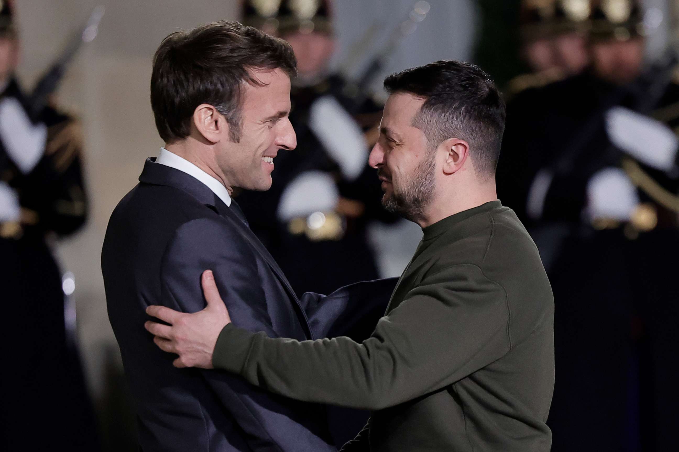 PHOTO: French President Emmanuel Macron, left, welcomes Ukrainian President Volodymyr Zelenskyy at the Elysee Palace before a working diner with German Chancellor Olaf Scholz, Wednesday, Feb. 8, 2023 in Paris.