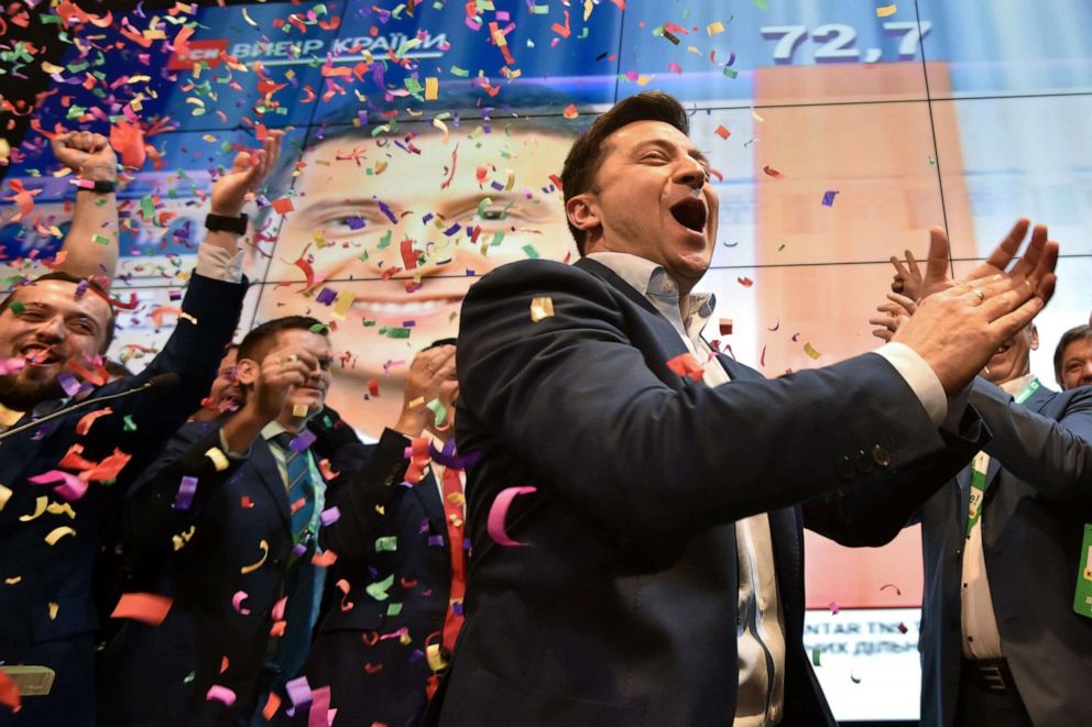 PHOTO: Ukrainian comedian and presidential candidate Volodymyr Zelensky reacts after the announcement of the first exit poll results in the second round of Ukraine's presidential election at his campaign headquarters in Kiev on April 21, 2019.