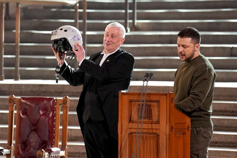 PHOTO: Speaker of the House of Commons, Sir Lindsay Hoyle, left, holds the helmet of one of the most successful Ukrainian pilots which was presented to him by Ukrainian President Volodymyr Zelenskyy on Feb. 8, 2023.