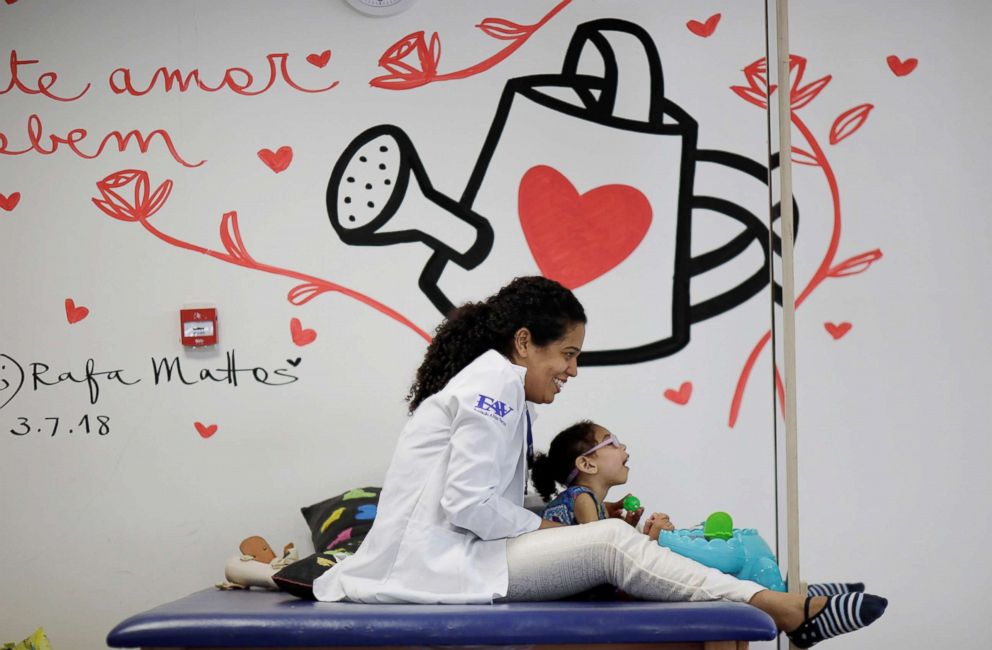 PHOTO: Luana Vieira, who is two years old, and was born with microcephaly, reacts to stimulus during an evaluation session with a physiotherapist at the Altino Ventura rehabilitation center in Recife, Brazil, Aug. 6, 2018.