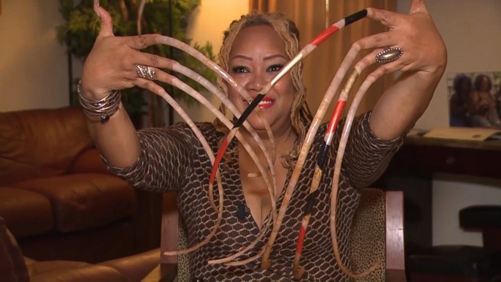Woman with World's Longest Nails Breaks Her Record Then Cuts Them