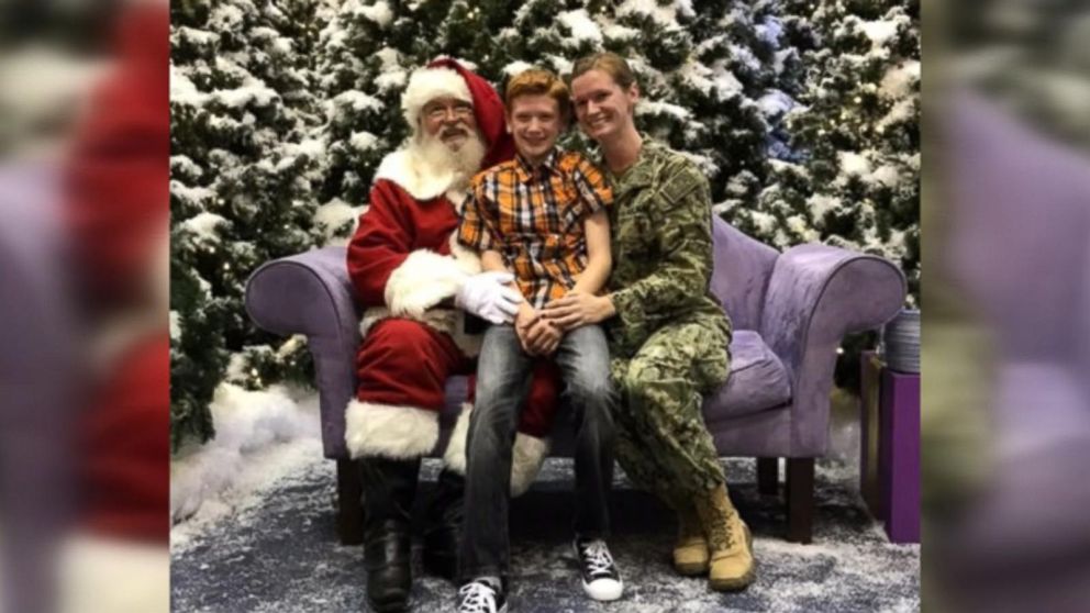 Premium Photo  Mom and son sort out santa's gifts under the