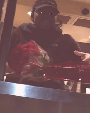 Man performs random act of kindness by giving flowers and chocolate to a Starbucks employee who doesn't have a valentine. "You deserve it."