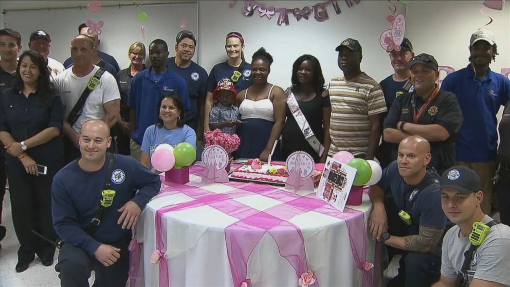 Firefighters throw baby shower for woman who lost apartment in fire