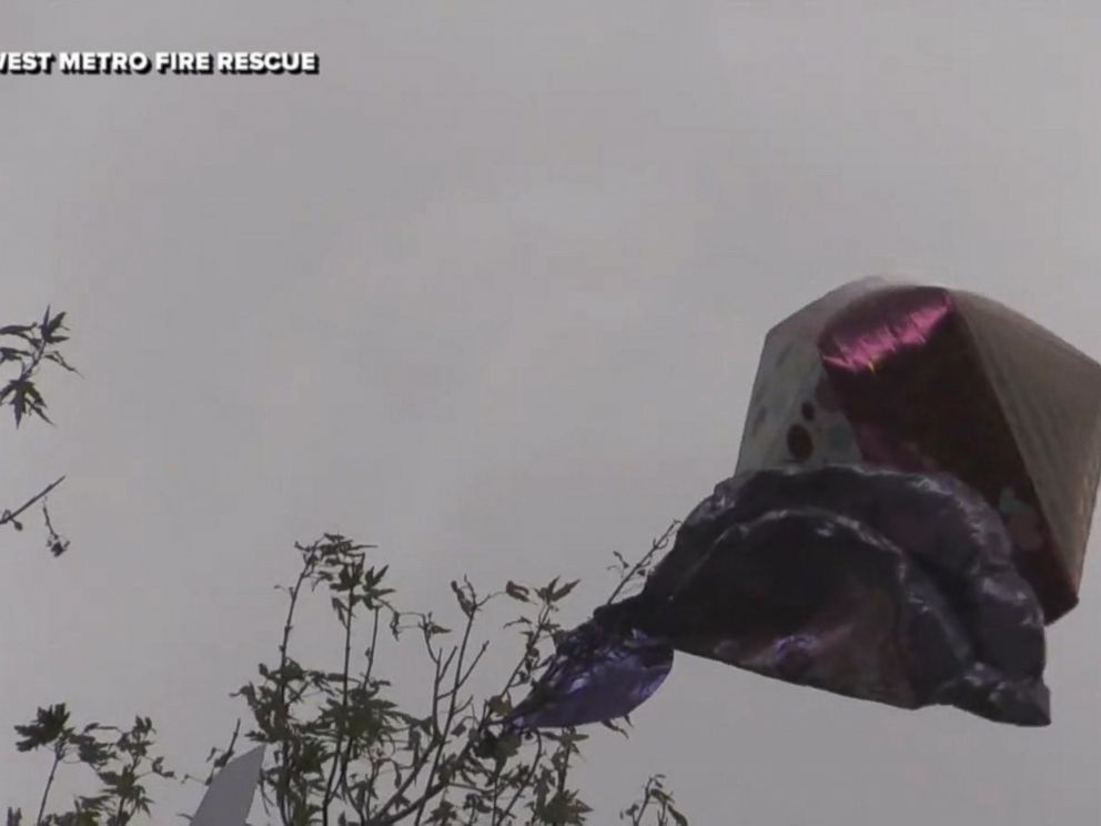 Firefighters help rescue little boys card tied to balloon to deceased mom in heaven.
